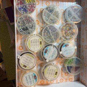 Assorted Eyelet Kit s and buttons for Crafting or sewing g